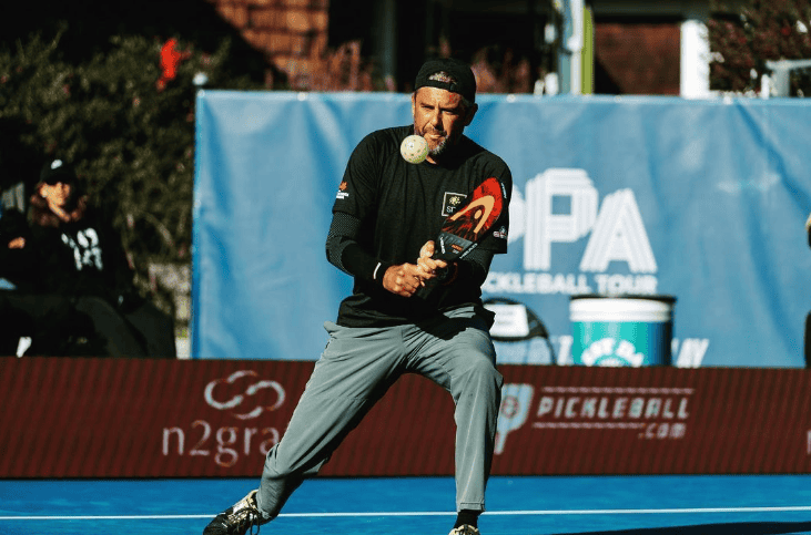 Steve Deakin playing with pickleball paddle